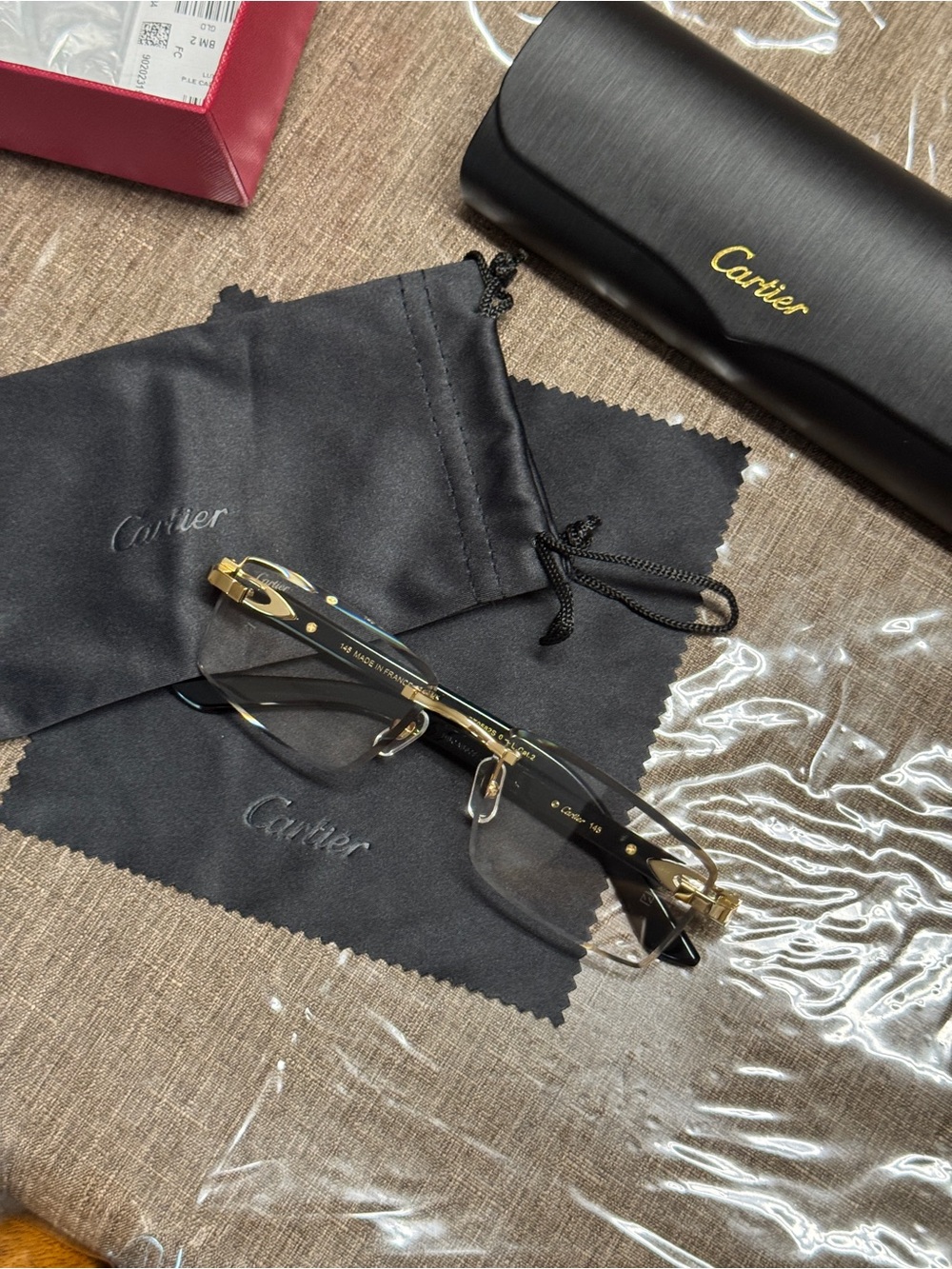 Cartier Black and Gold Rimless Optical Frames